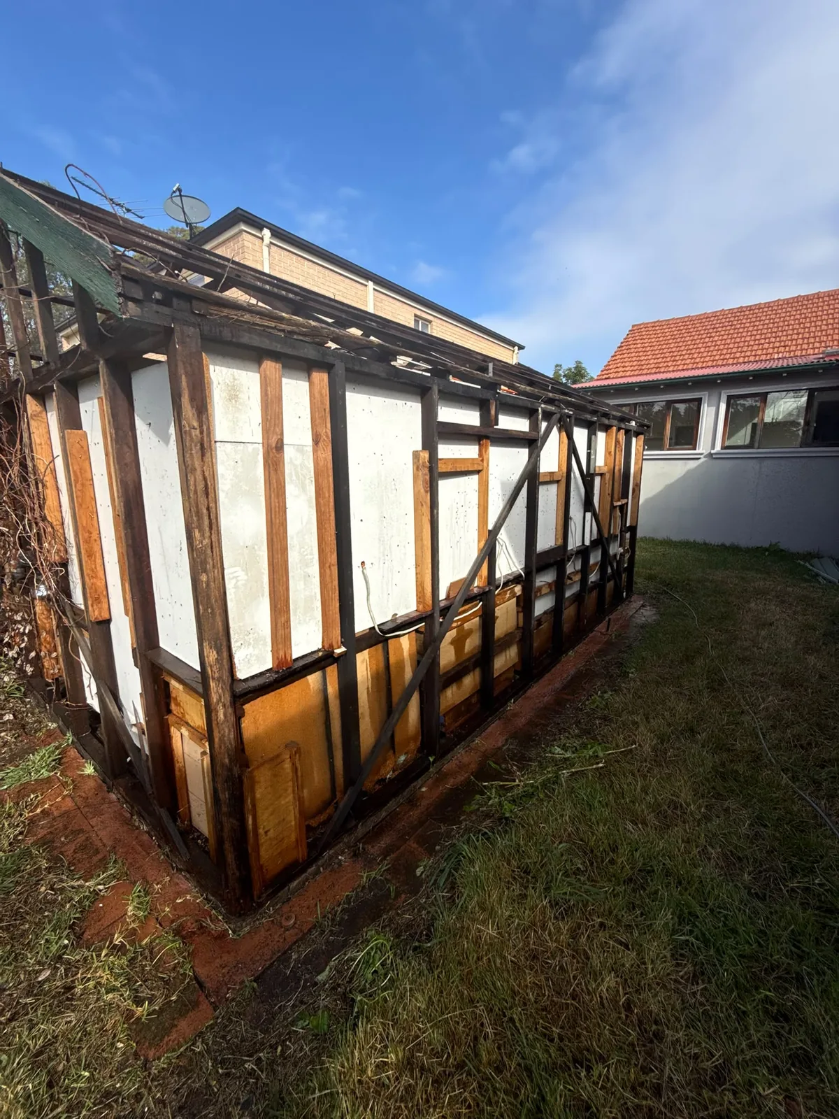 Outbuilding wall removal project